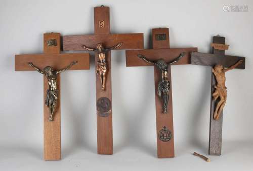 Four antique crucifixes
