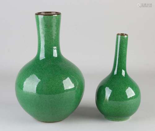 Two Chinese celadon vases, H 20 - 25 cm.