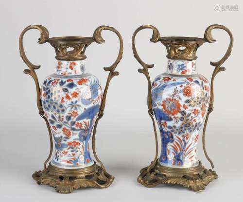 Two Imari vases, H 20 cm.