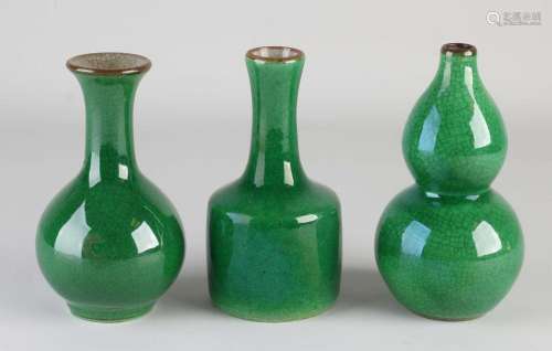 Three Chinese celadon vases, H 14 - 15 cm.