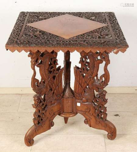 Carved Indonesian teak table