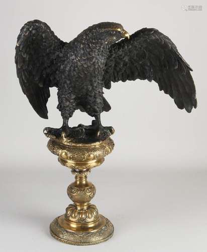 Solid bronze eagle on pedestal