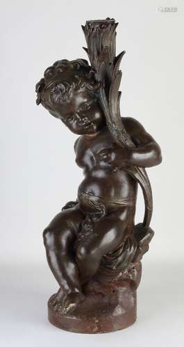 Heavy cast iron putti