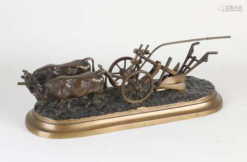 Antique bronze figure, oxen with plow