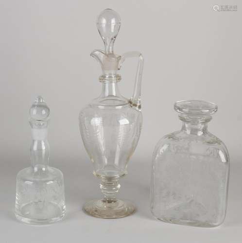 Three mouth-blown carafes