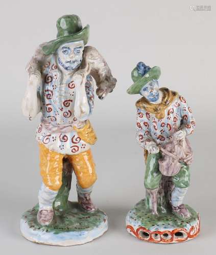 Two antique Delft figures