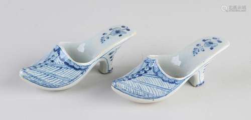 Two antique Delft shoes