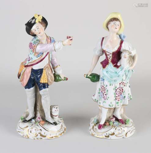 Two porcelain statues, H 22 cm.