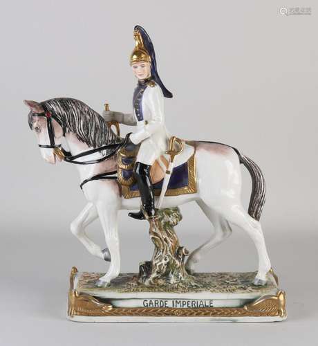 Porcelain cavalryman on horseback horse