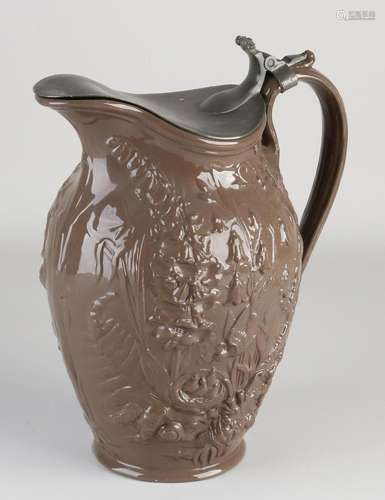 Pitcher with tin lid