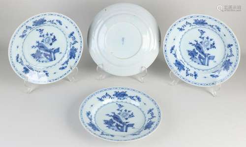 Four Delft plates Ø 23 cm.