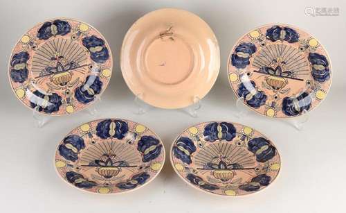 Five Delft plates Ø 23.5 cm.