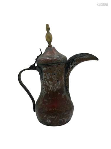 A 19th Middle Eastern Dallah copper coffee pot