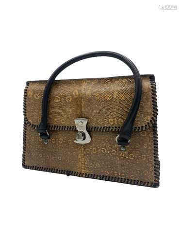 Gucci - A lizard skin handbag.