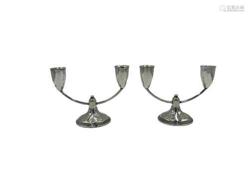 A pair of Art Deco sterling silver candlesticks