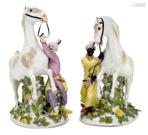 PAIR OF FIGURES WITH A HORSE AND A GROOM