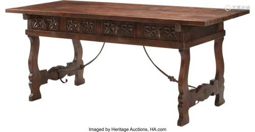 A Spanish Renaissance-Style Walnut Four Drawer T