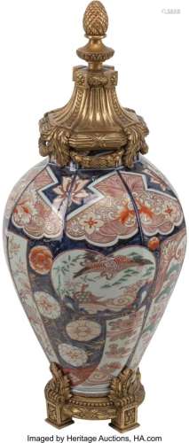 A Japanese Imari Vase with Carved Giltwood Cover