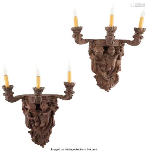 A Pair of Victorian Carved Walnut Figural Three-