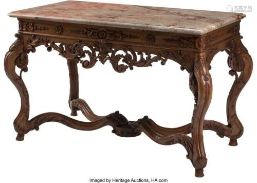 A French Régence-Style Carved Walnut Table with