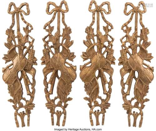 A Set of Four French Carved Giltwood Wall Trophi