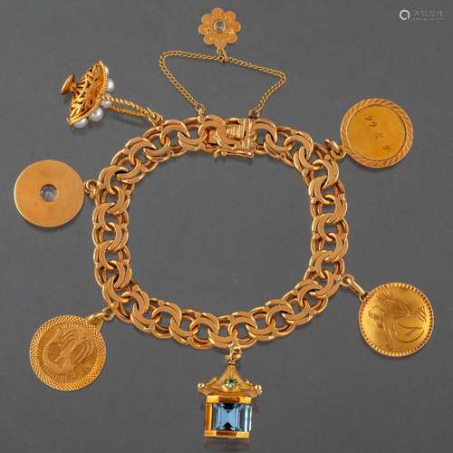 Pulsera de eslabones con colgantes en oro amarillo de 18 kt.