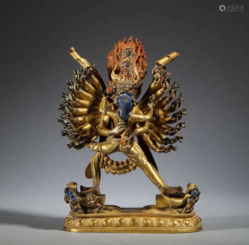 In the Ming Dynasty, bronze gilded thousand hand Buddha stat...