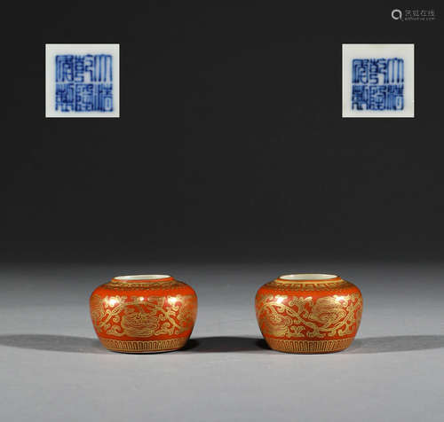 In the Qing Dynasty, a pair of golden bird food cans were pa...