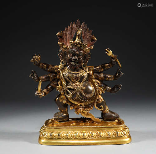 In the Qing Dynasty, the six armed GAHA Lama was gilded with...