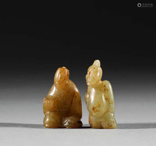 In the Han Dynasty, a pair of jade figurines in Hotan