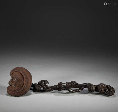 In the Qing Dynasty, red sandalwood was inlaid with Ganoderm...