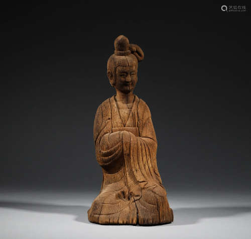 In the Northern Wei Dynasty, there was a wooden maid statue