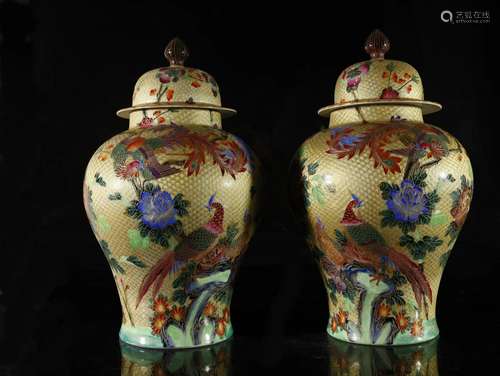 A pair of gold-ground 'flower and bird' jars