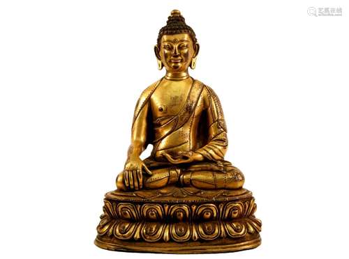 A Gilt Bronze Figure Of Buddha