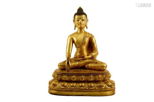 A Gilt Bronze Figure Of Buddha.With inscriptions