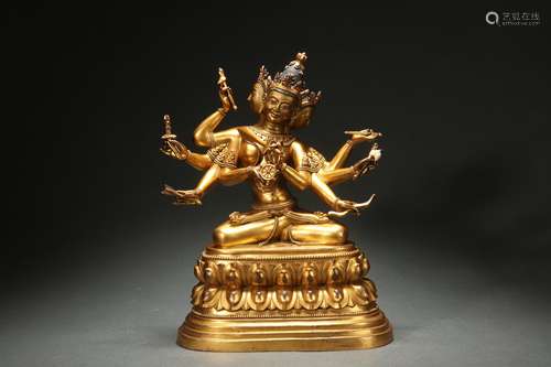 Gilt Bronze Statue of Avalokitesvara with Three Faces and Ei...