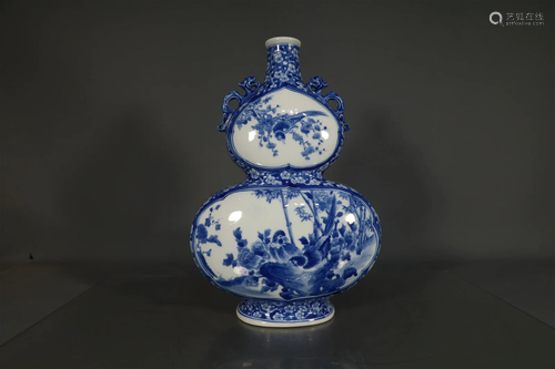 A Blue And White 'Magpie' Gourd-Shaped Vase