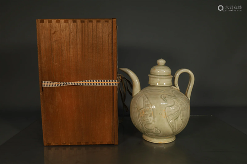 A Delicate Yue-Kiln Flower-Carved Wine Decanter