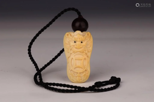 Ivory Carved Dragon Pendant