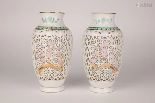 A Pair of White Glazed Openwork Plum Blossom Bottle Vases, 2...