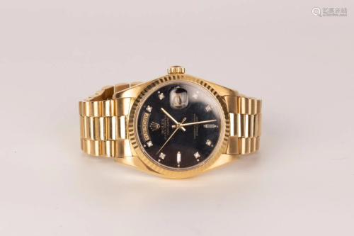 Rolex Oyster Perpetual Day-Date 18K Yellow Gold with Black D...