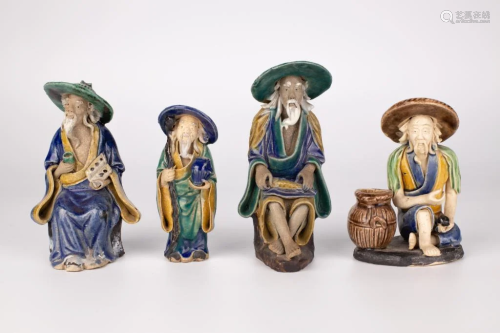 A Set of Four Shiwan-ware Statuettes
