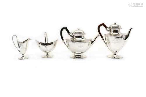 A silver four piece tea service