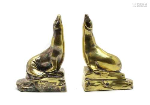 A pair of French silver plated seal bookends,