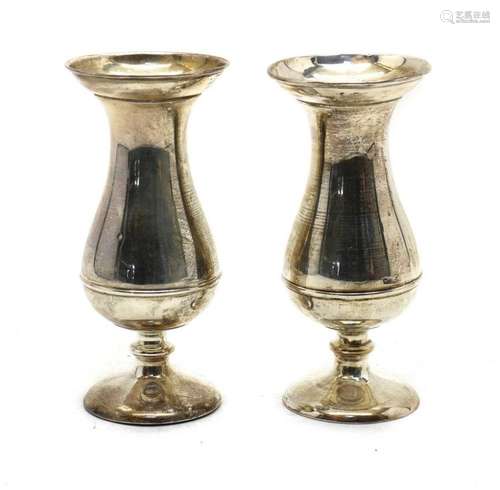 A pair of Edwardian silver bud vases