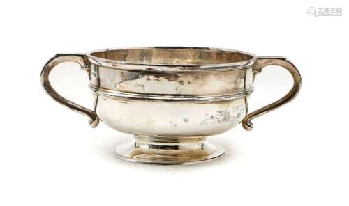 A silver twin handled pedestal bowl