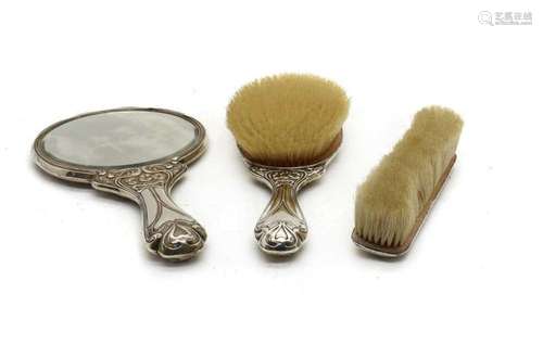 An Art Nouveau silver mounted dressing table set,