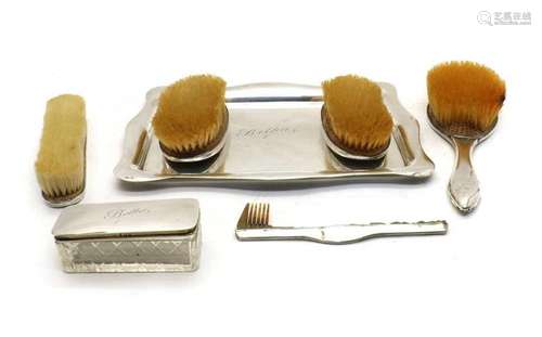 A modern silver dressing table set,