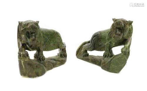 A pair of floor standing Chinese soapstone lions,