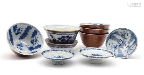 A collection of Chinese blue and white cups and covers,